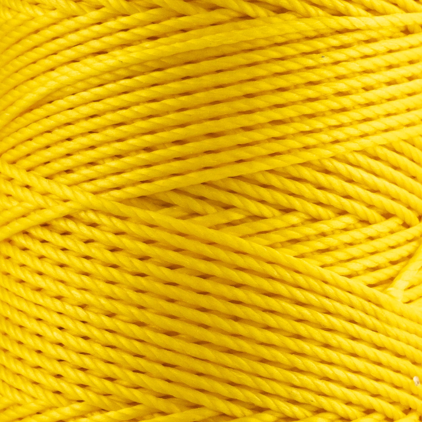 Hilo de poliéster encerado